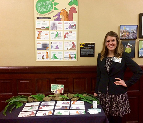 Kara Rinella in front of her artwork.