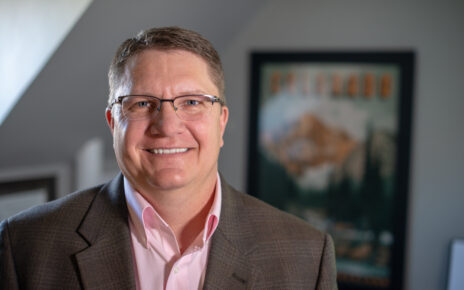 Jerry Frank poses in his office in Read Hall.