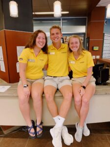 Three Summer Welcome leaders pose for a photo.