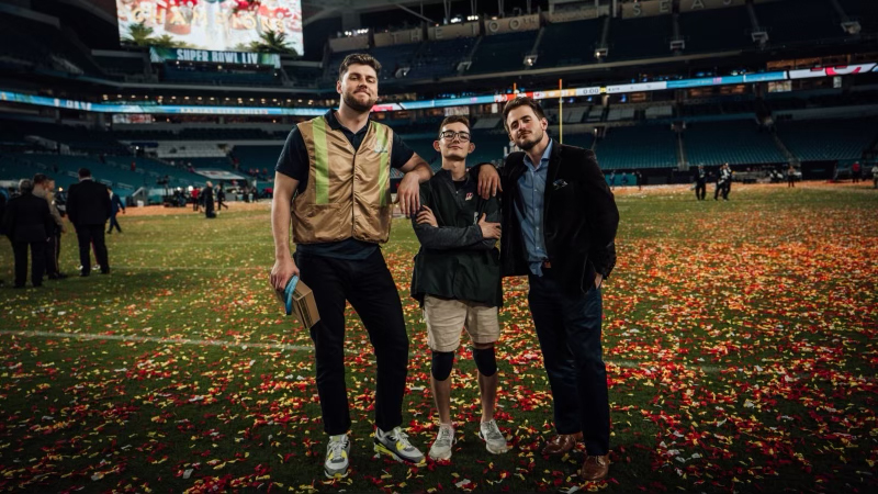 Left to right: Alumni Bryndon Minter, student Diego Galicia and NFL social media co-worker Benji Gallagher pose after the Chief's 2020 Super Bowl win. Note: This photo was taken prior to COVID-19.