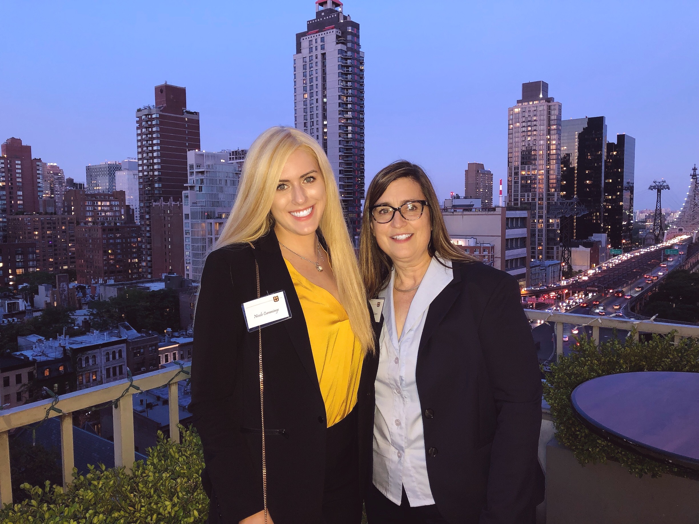 Nicole Cummings (left) with her mentor, Mary Beth Mars, in New York during the Tigers on Wall Street trip. Taken pre-COVID.