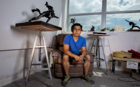Artist Kiet Le poses in his studio.